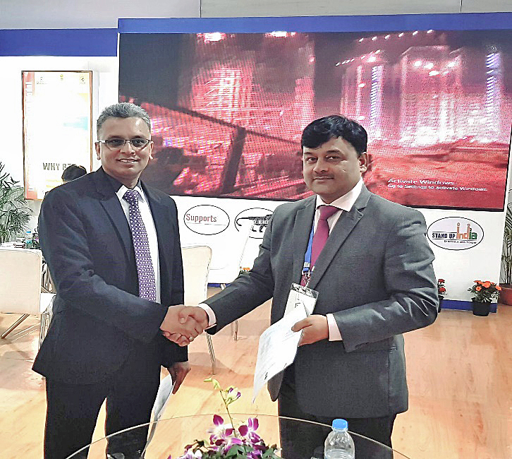 SHAKE: Mr K Srinivas Patnaik (MD and CEO of TMG Asia) is pictured with Shri Anand Prakash Tiwari (Director of Assam Skill Development Mission) signing the MOU